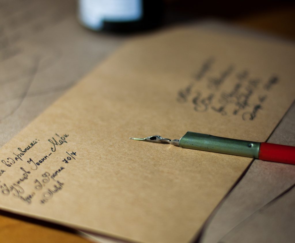 ink pen on hand written envelope